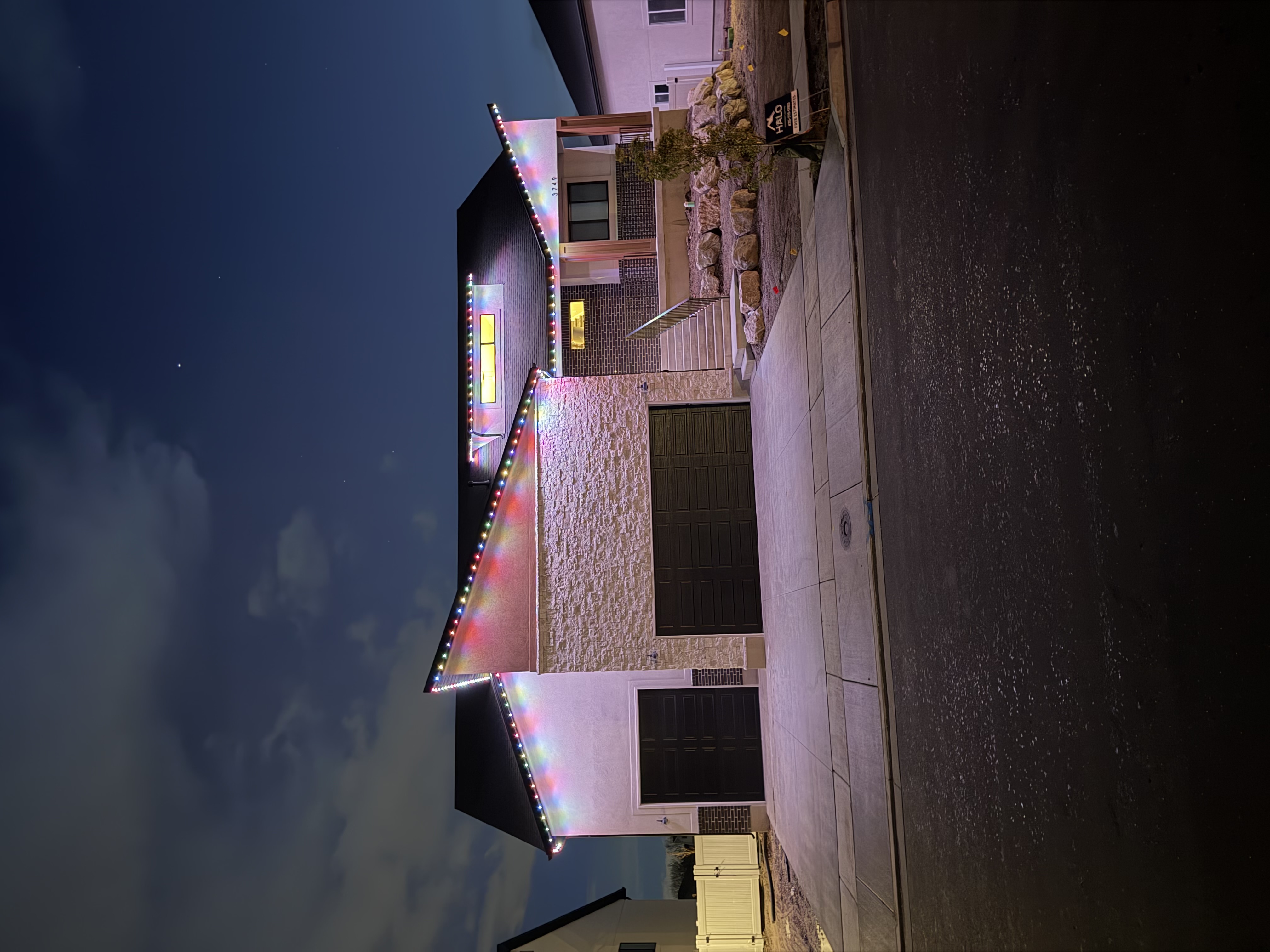 Warm white LED lights accenting roofline