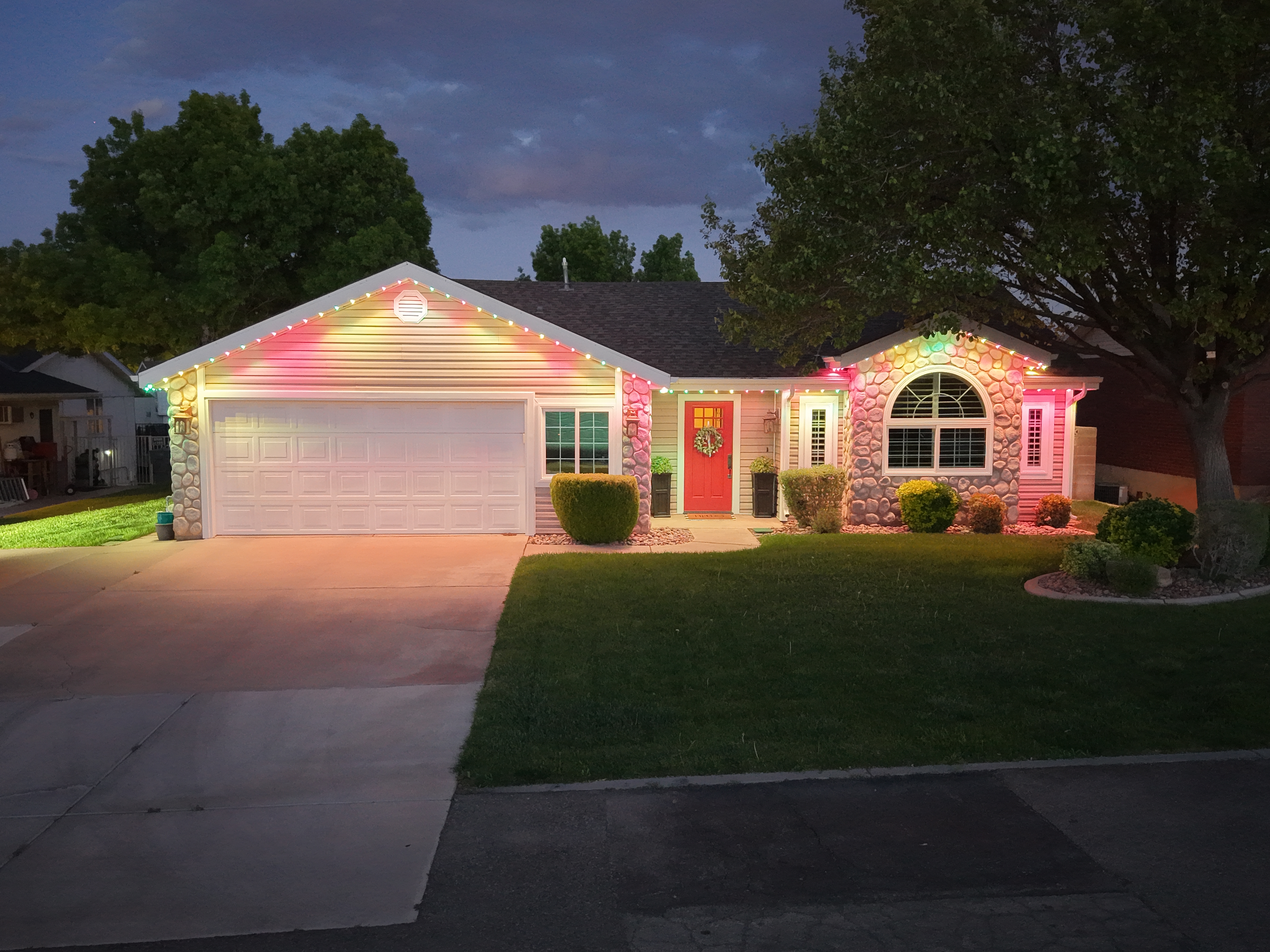 Permanent LED lighting on modern home at night